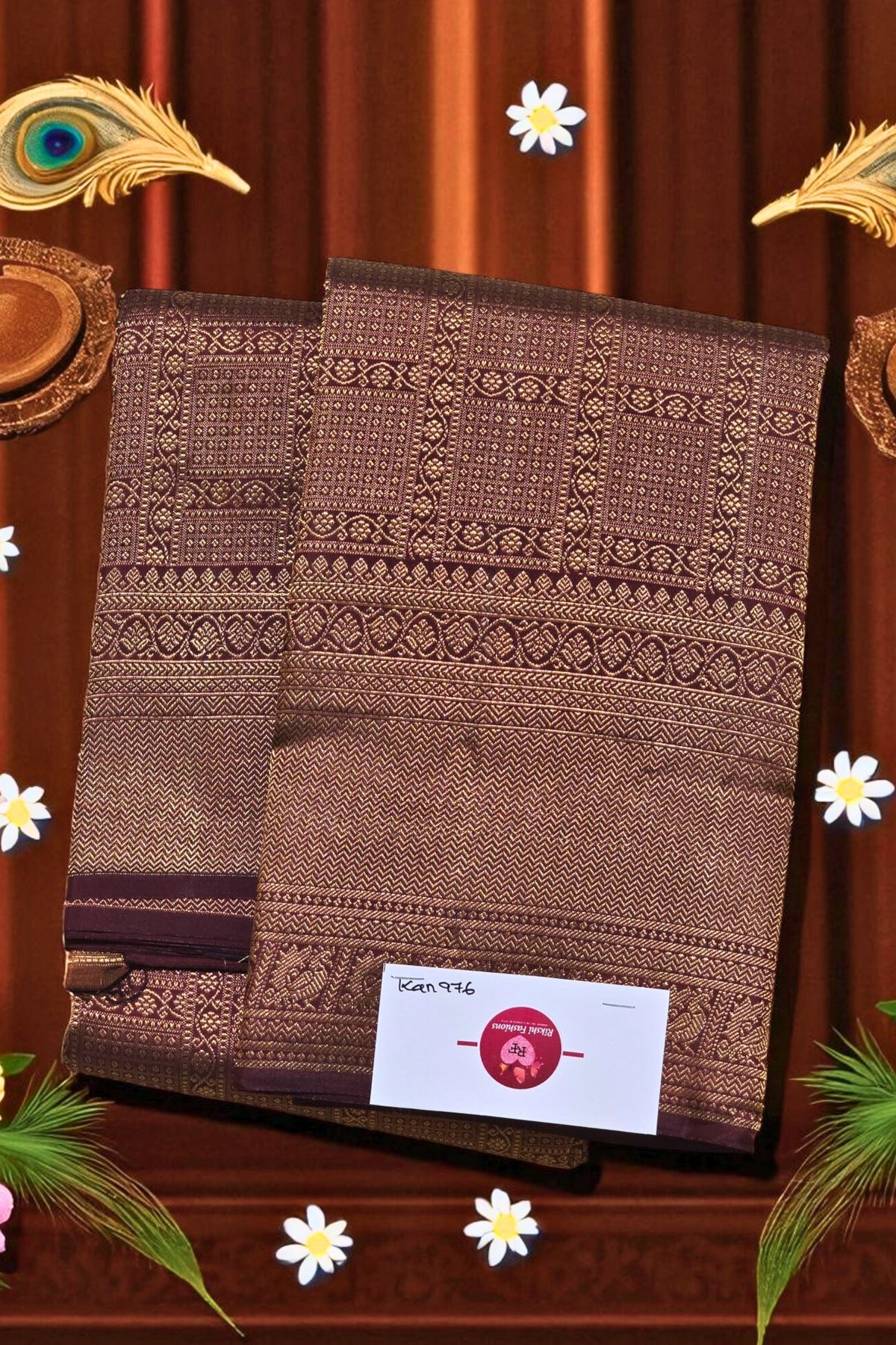 Brown saree with intricate patterns on a wooden background