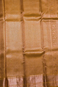 Close-up of brown fabric with a subtle pattern