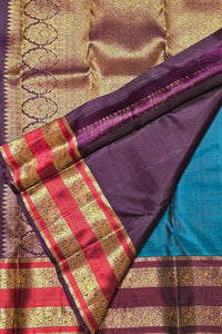 Colorful traditional fabric with intricate patterns and borders