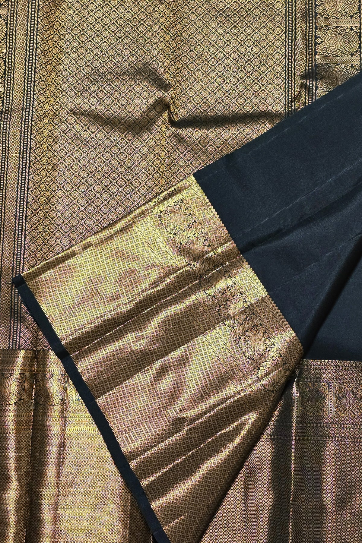 Close-up of a traditional fabric with intricate patterns and embroidery.