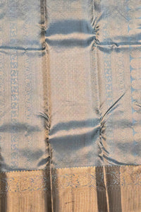 Close-up of a patterned fabric with blue and brown tones