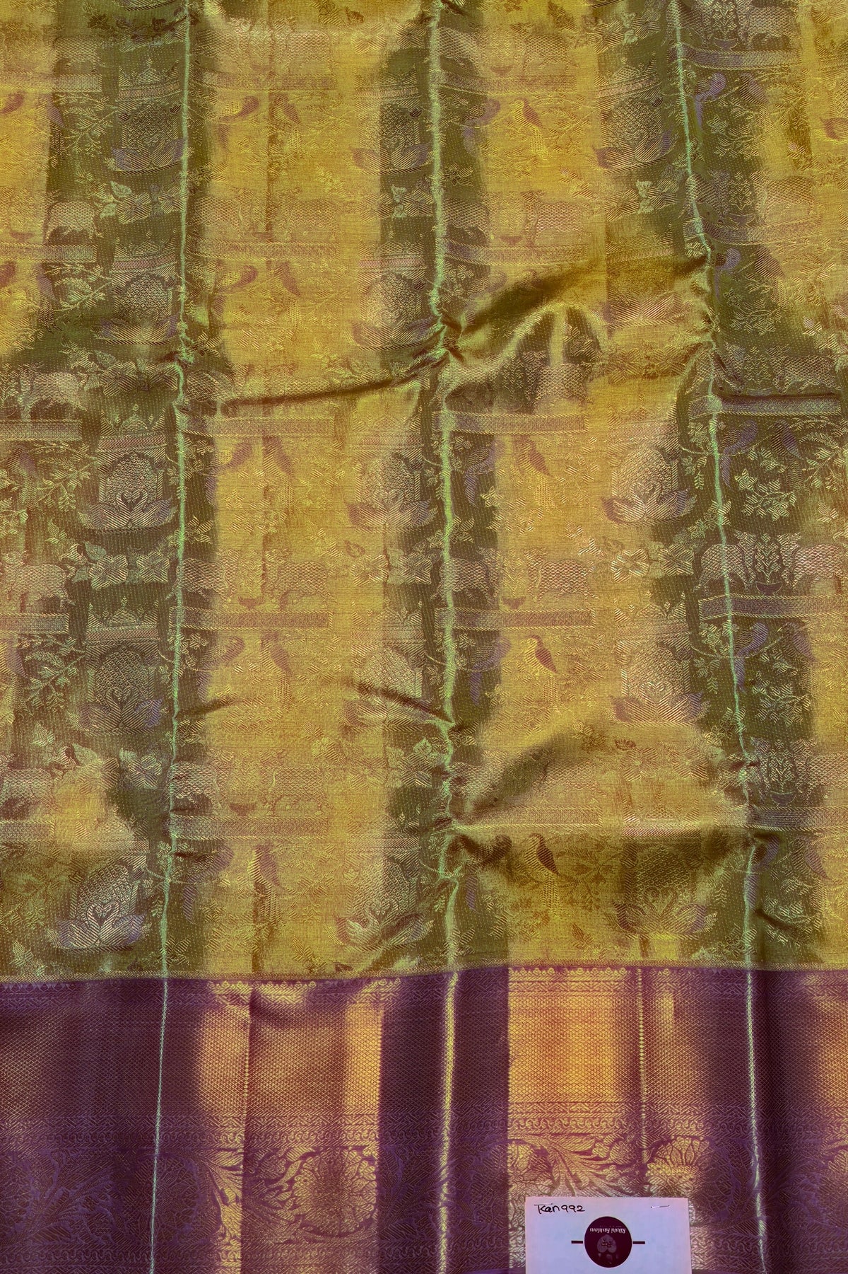 Silk fabric with green and purple pattern