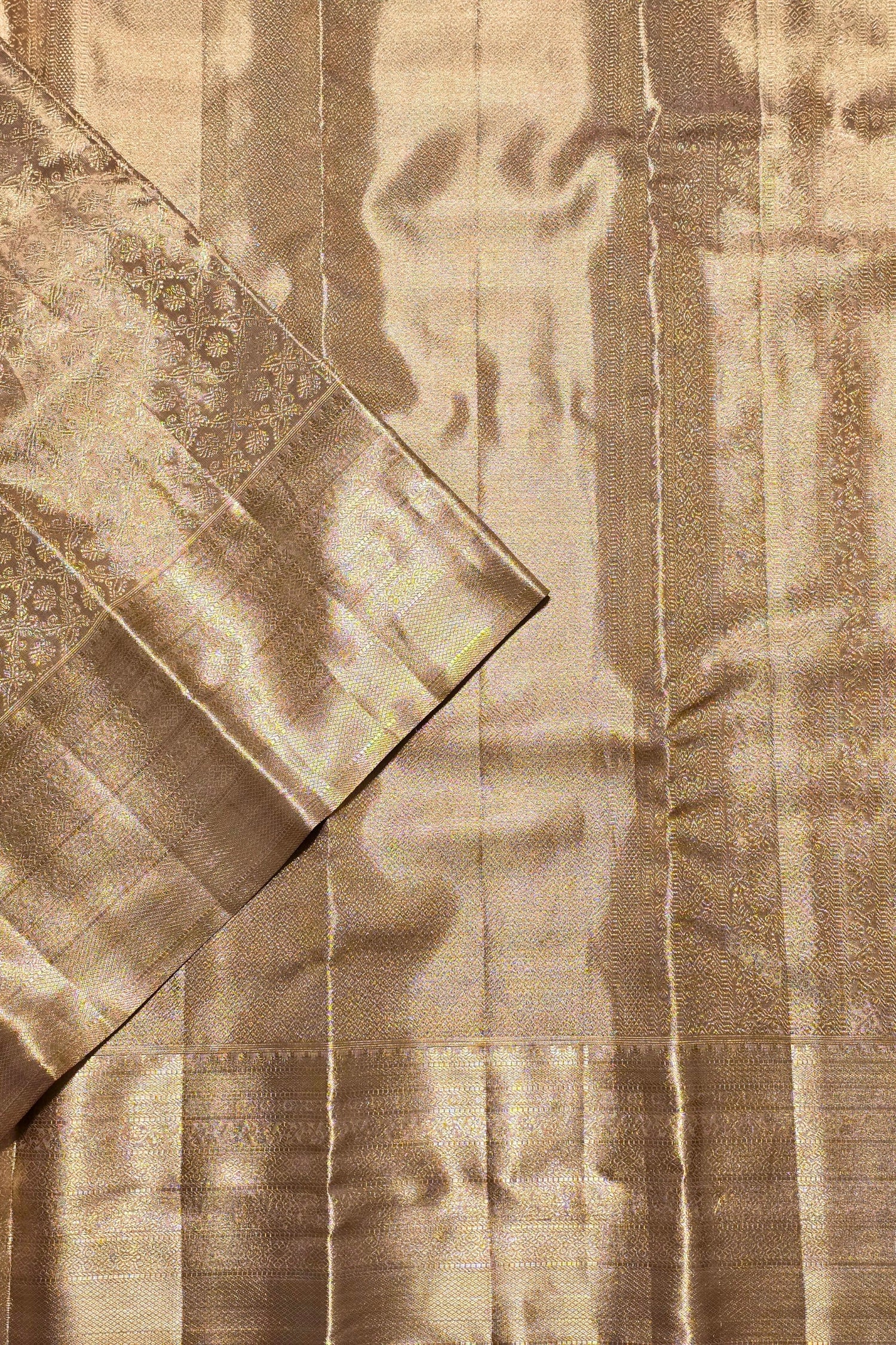 Close-up of beige textured fabric with a subtle pattern