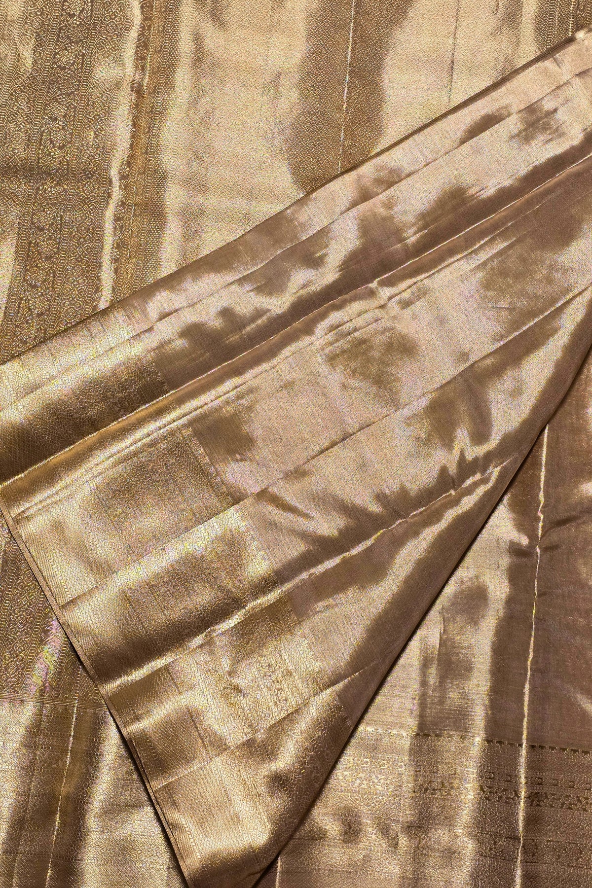 Close-up of brown fabric with intricate patterns