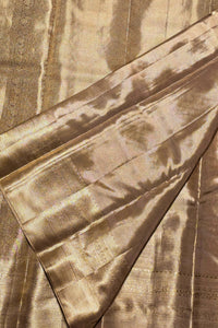 Close-up of brown fabric with intricate patterns