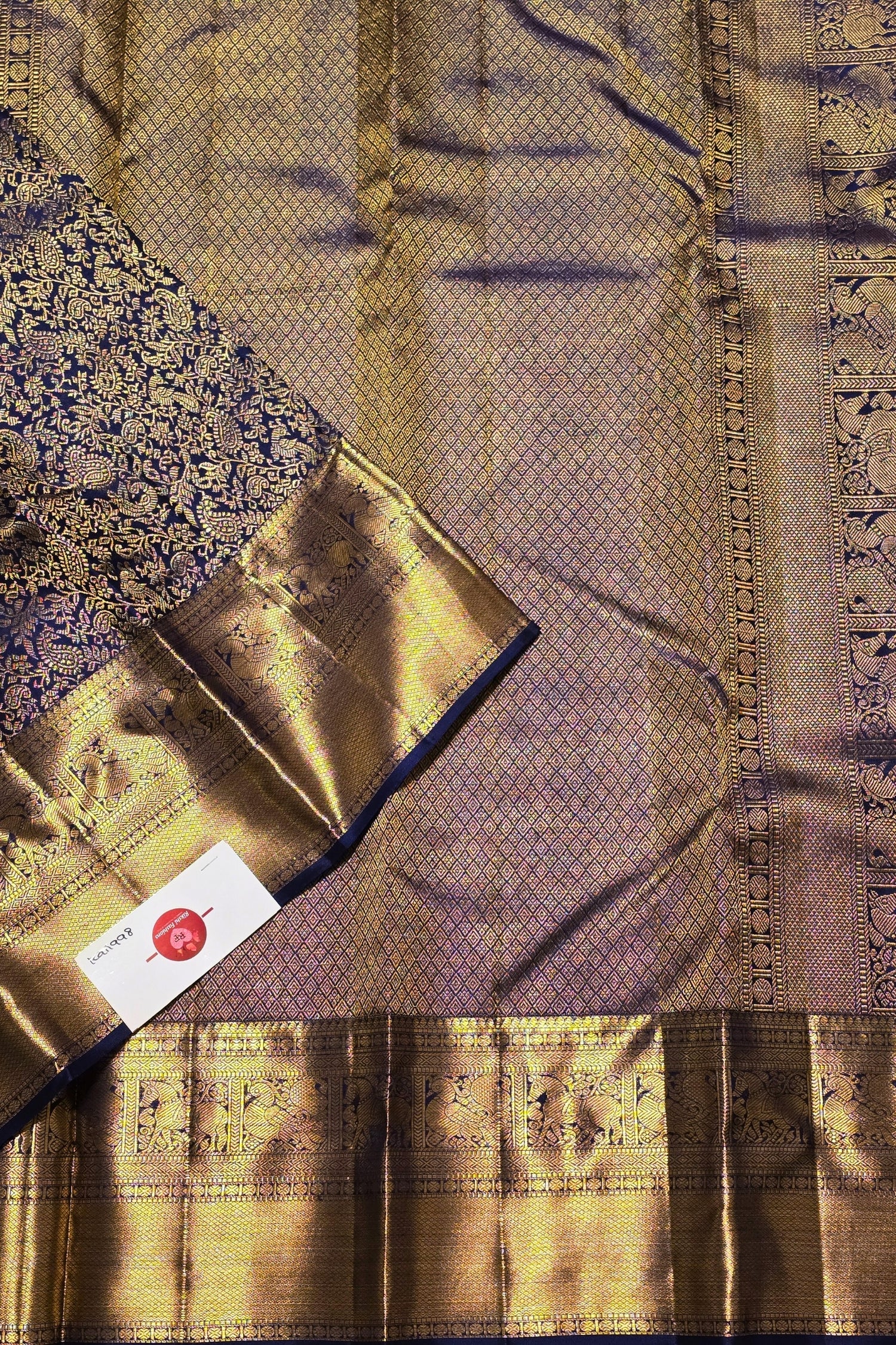 Mysterious and magnificent, this Dark Blue Kanchipuram Silk Saree