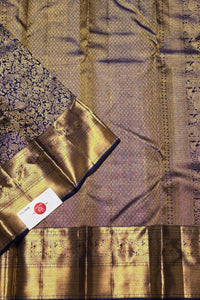 Mysterious and magnificent, this Dark Blue Kanchipuram Silk Saree