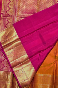 Saree with pink and gold border on a pink background
