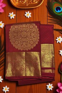 Rich Maroon Kanchipuram Silk Saree with Grand Gold Zari Detailing