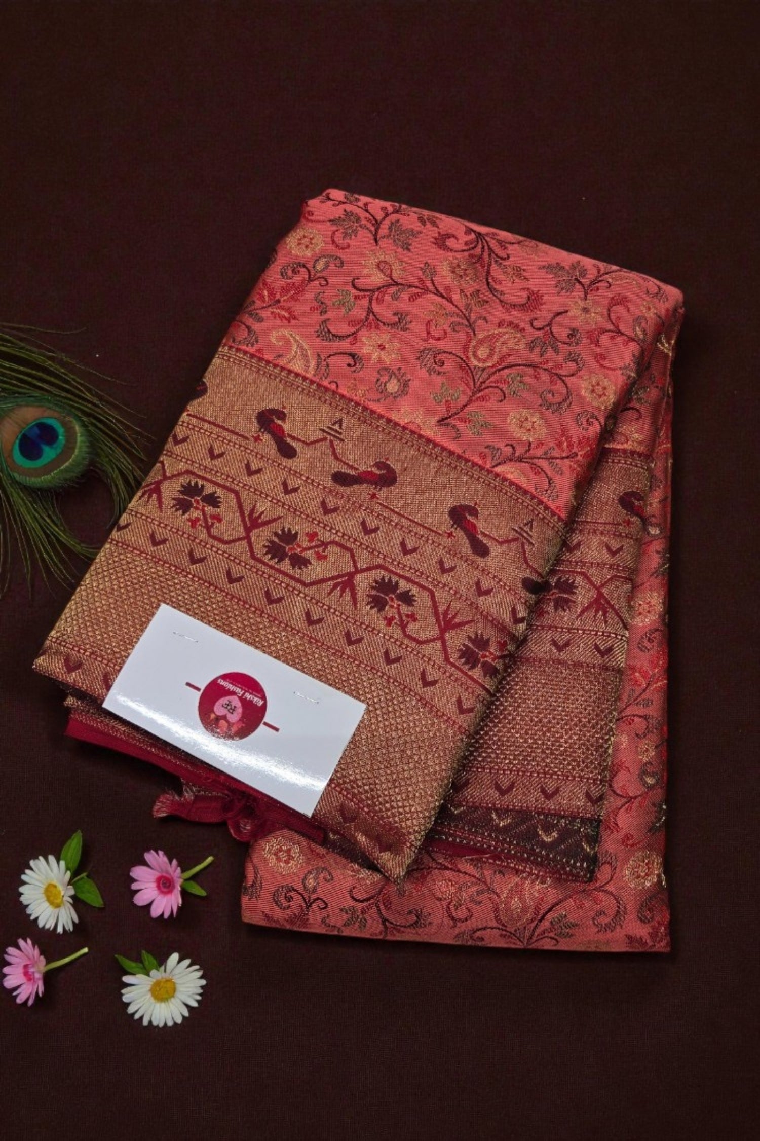 Traditional Pink Kanchipuram Silk Saree with Intricate Floral Patterns