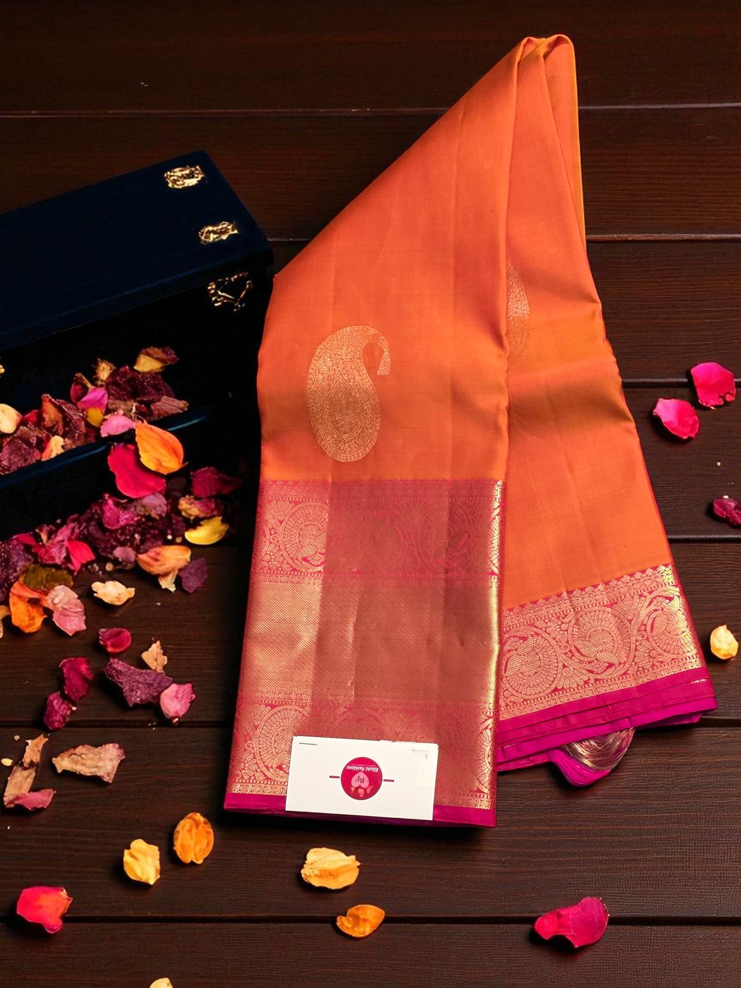 Orange Kanchipuram Silk Saree with Purple Border