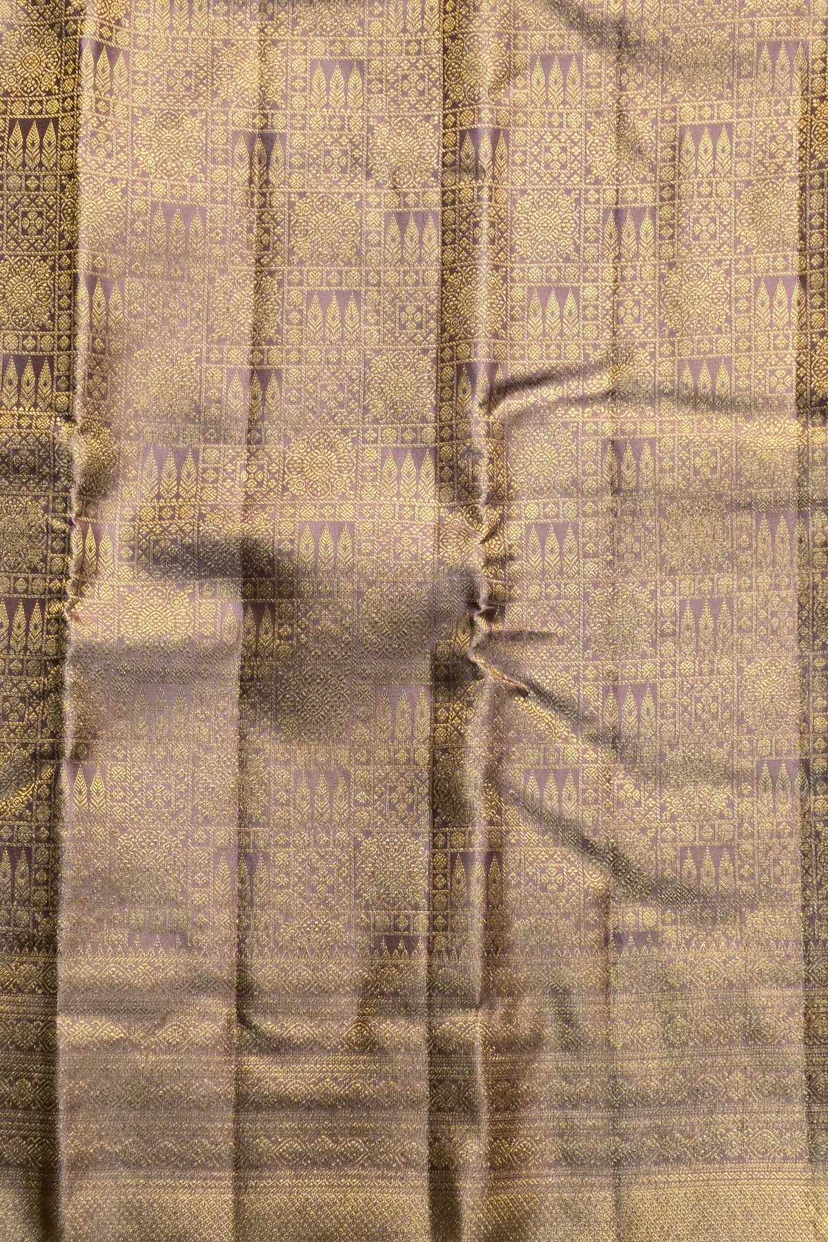 Textured fabric with a pattern of raised lines and shadows