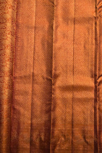 Close-up of brown fabric with subtle patterns