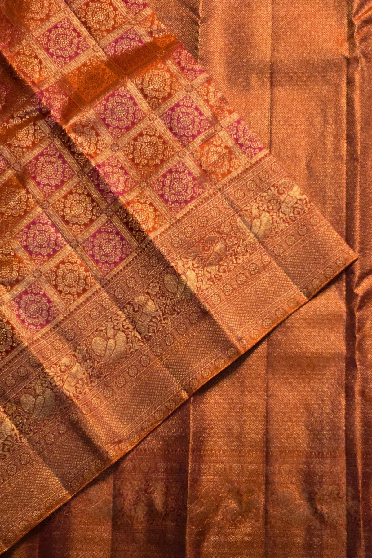 Close-up of a brown fabric with intricate patterns