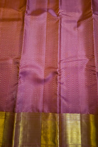 Royal Purple Silk Saree with Wide Gold Zari Border, showcasing elegant fabric texture and gold zari border.