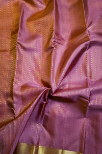 Royal Purple Silk Saree with Wide Gold Zari Border, showcasing its elegant drape and luxurious texture.