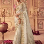 Fanciable Off-White Embroidered Chinnon Party Wear Saree With Blouse