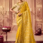 Vibrant Yellow Embroidered Chinnon Wedding Wear Saree With Blouse